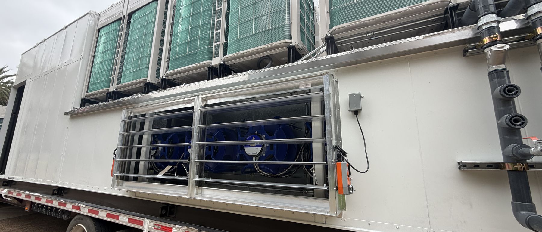 Purpose-built replacement multi-zone unit on a flatbed, built to match an obsolete opening