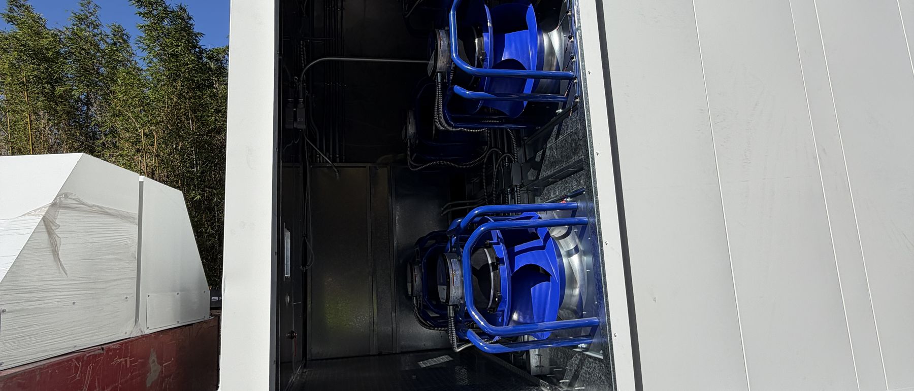 Interior fan and coil section of an all-electric replacement unit